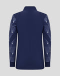 Front view of navy junior matchday jacket showing crest on the chest and striped sleeve panels.