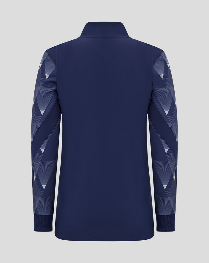 Front view of navy junior matchday jacket showing crest on the chest and striped sleeve panels.
