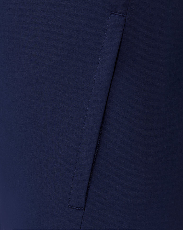 Close-up of navy fabric and seam lines on the Junior 25/26 matchday jacket.
