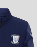 Back view of navy junior matchday jacket with geometric striped sleeves and ribbed cuffs.