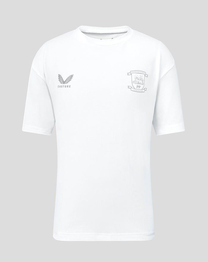 White junior travel shirt with CASTORE logo on the left chest and a crest on the right chest.