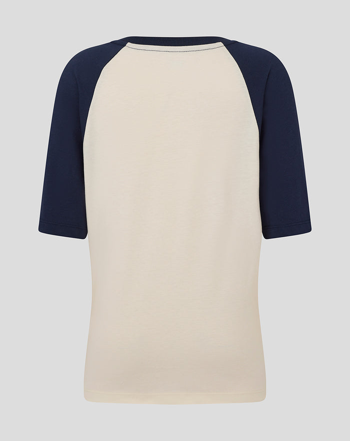 Back view of beige front raglan tee with navy sleeves from the Junior 25/26 collection