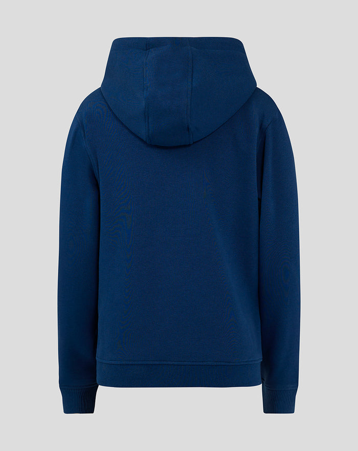Back view of navy junior hoodie featuring a large hood and ribbed hem