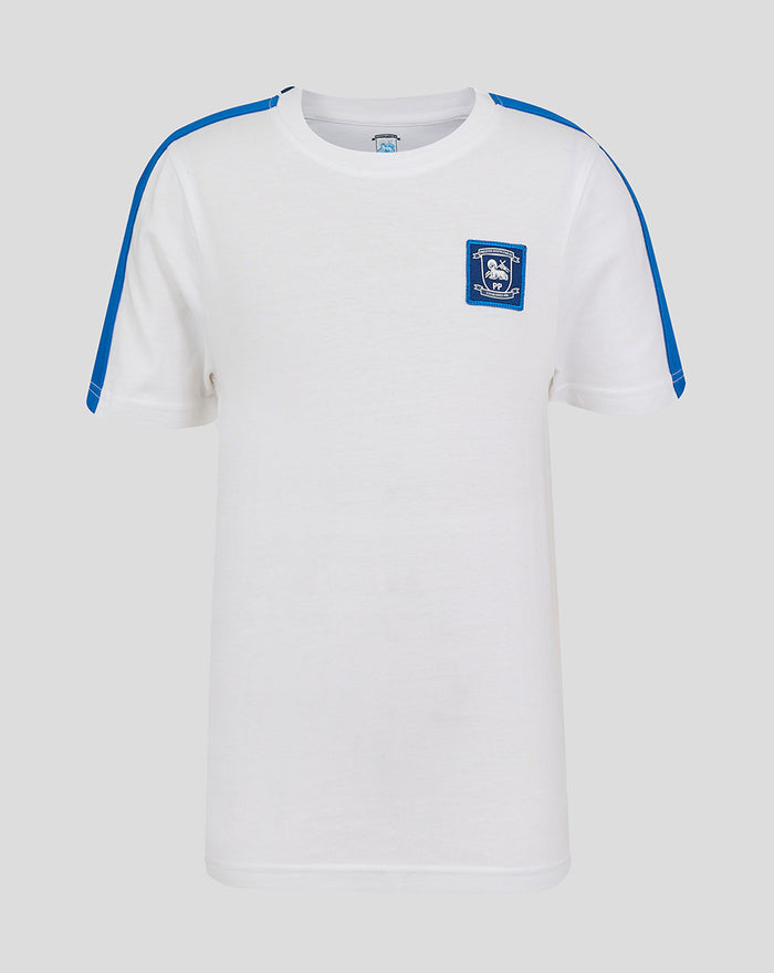 White cotton T shirt with blue shoulder stripes and a small blue crest on the left chest.