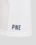 Close-up of the white T shirt hem with blue PNE print near the bottom edge.