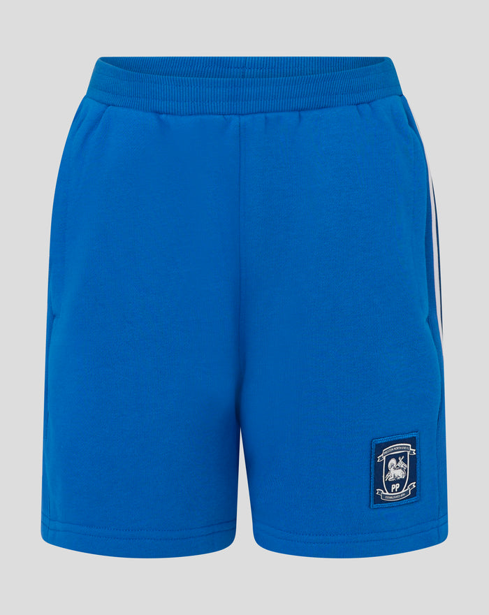 Blue athletic shorts with an elastic waistband and a shield crest patch on the leg