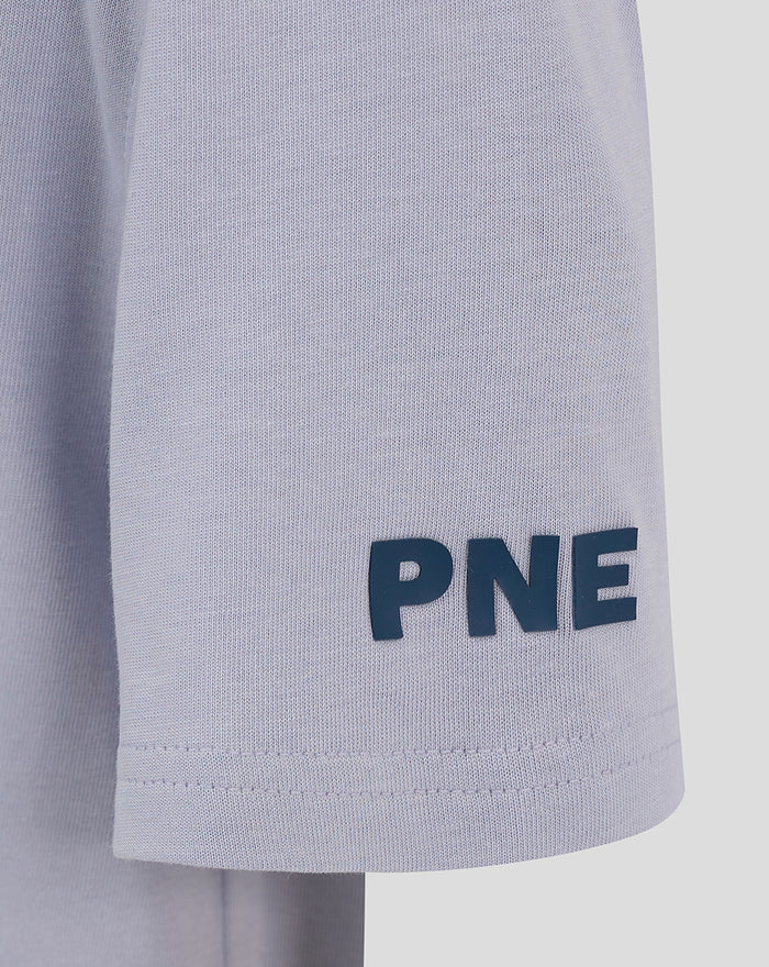 Lavender sleeve hem of the T-shirt with bold navy PNE lettering.