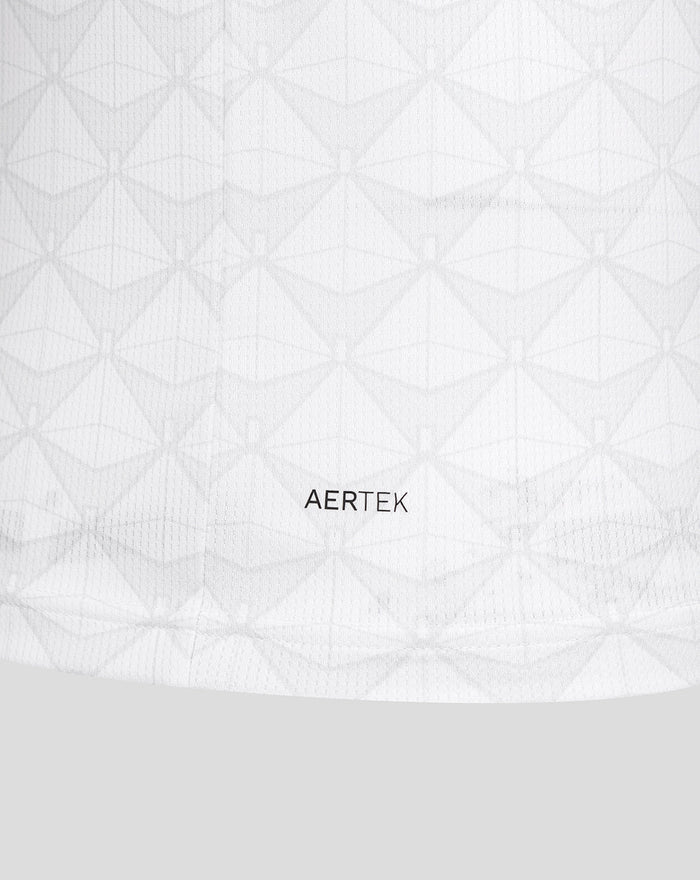White fabric with a subtle geometric pattern and the AERTEK logo centered.