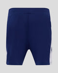 Back view of junior navy blue home shorts with an elastic waistband.