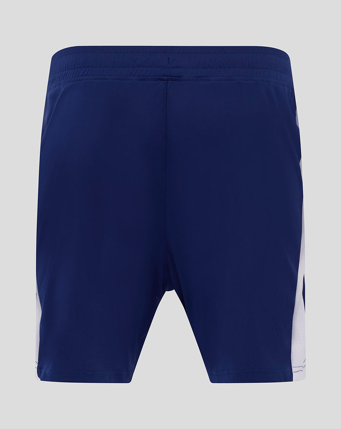 Back view of junior navy blue home shorts with an elastic waistband.