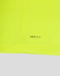 Close-up of neon lime fabric with AERTEK branding near the bottom hem.