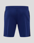 Back view of navy junior training shorts featuring a patterned side panel and club crest on the left leg.