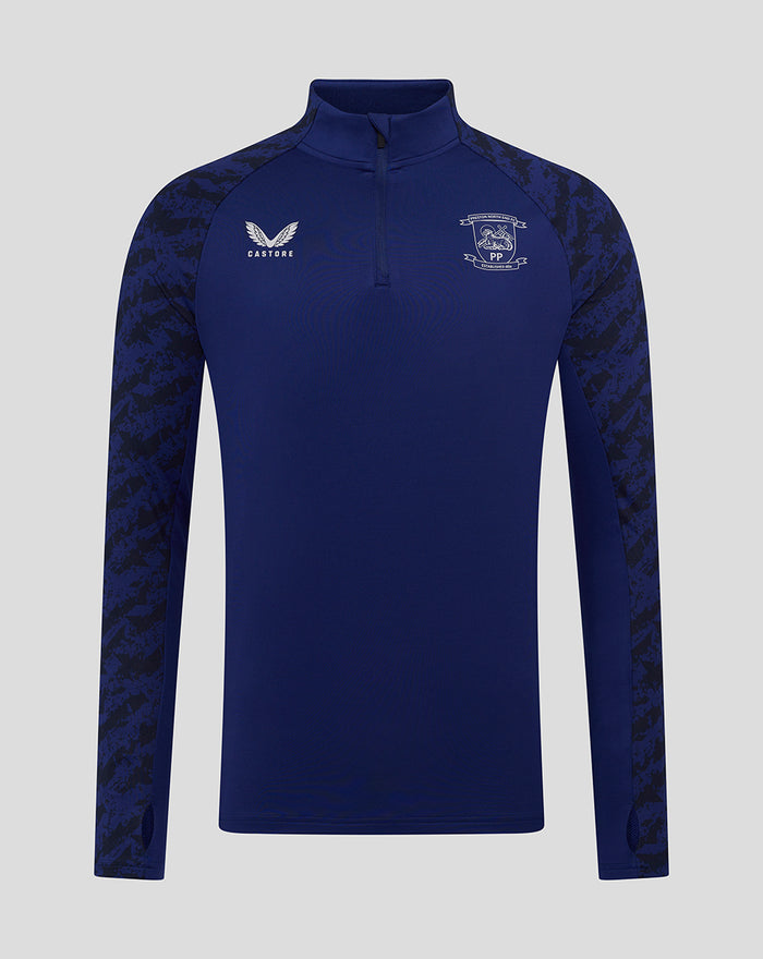 Front view of navy blue training midlayer with club crest and Castore logo on the chest