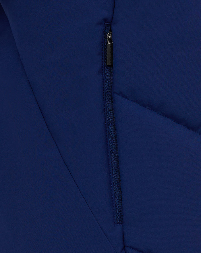 Close up of navy training gilet center front zipper against smooth fabric.