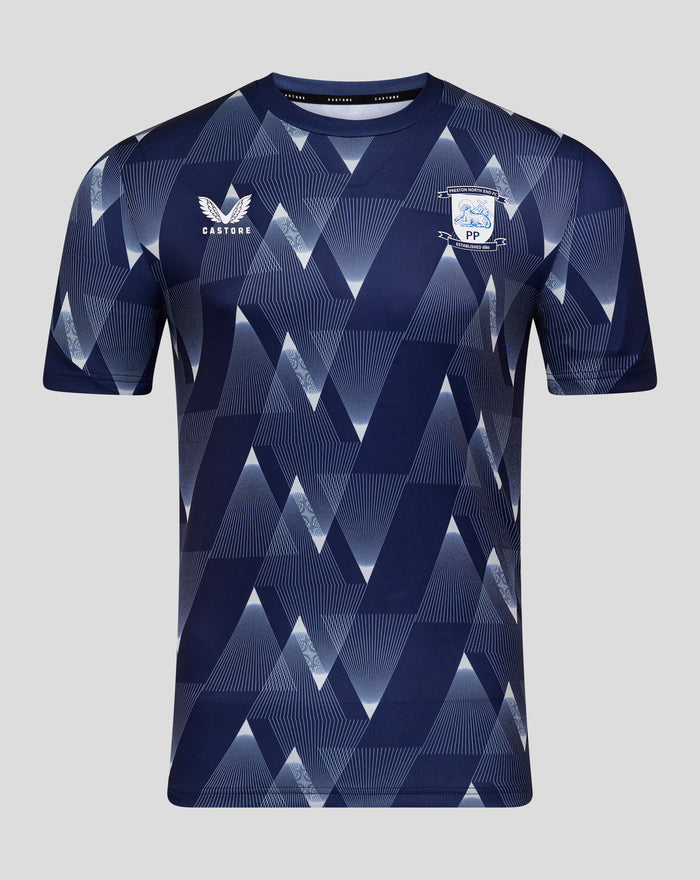 Front view of navy Preston North End Matchday Shirt with geometric pattern, Castore logo on left chest and club crest on right chest.