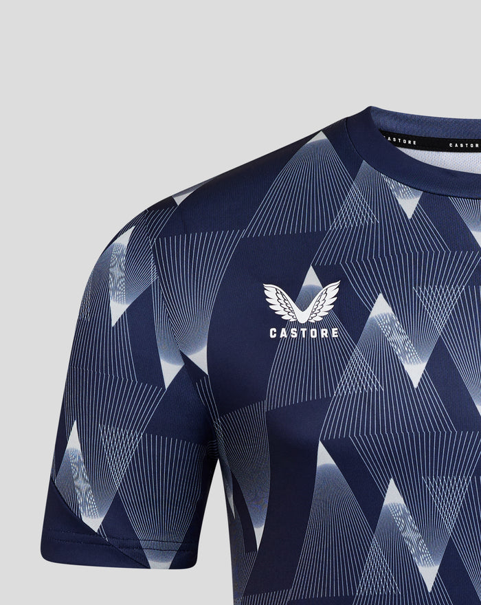 Shoulder and collar view of navy Preston North End matchday shirt with geometric print