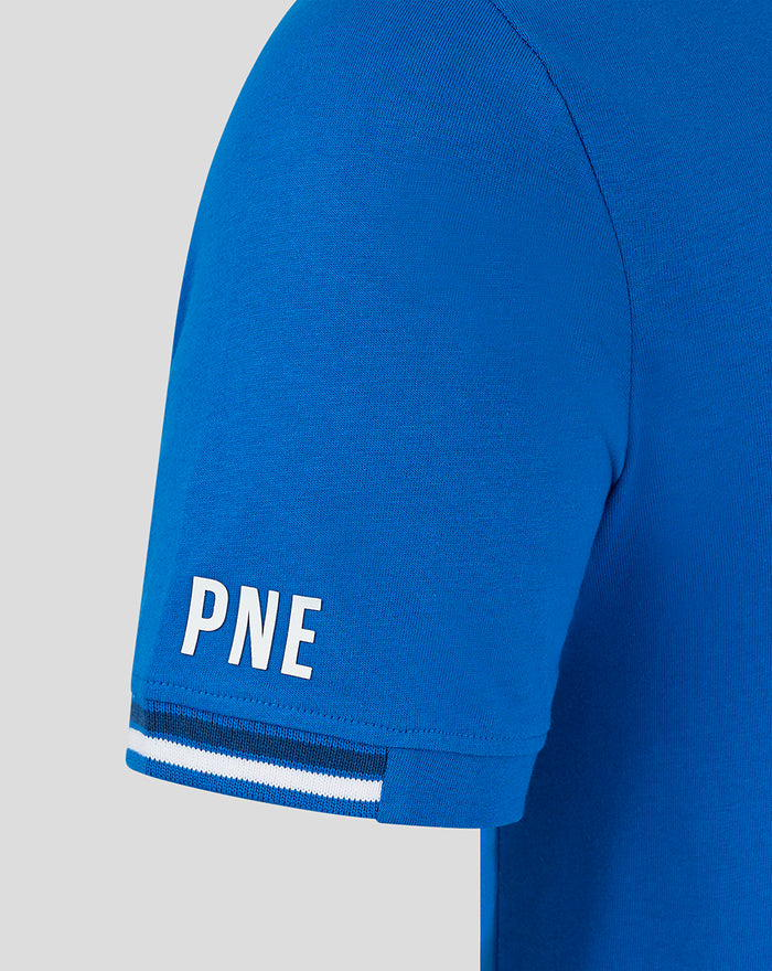 Close up of sleeve cuff on blue junior T shirt showing PNE lettering and white stripe detail