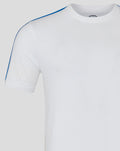 Close up of white men's classic cotton T shirt highlighting blue shoulder piping and a blue crest patch on the chest
