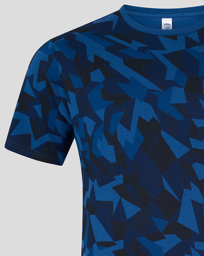 Close-up of blue geometric print T shirt with crew neck detail