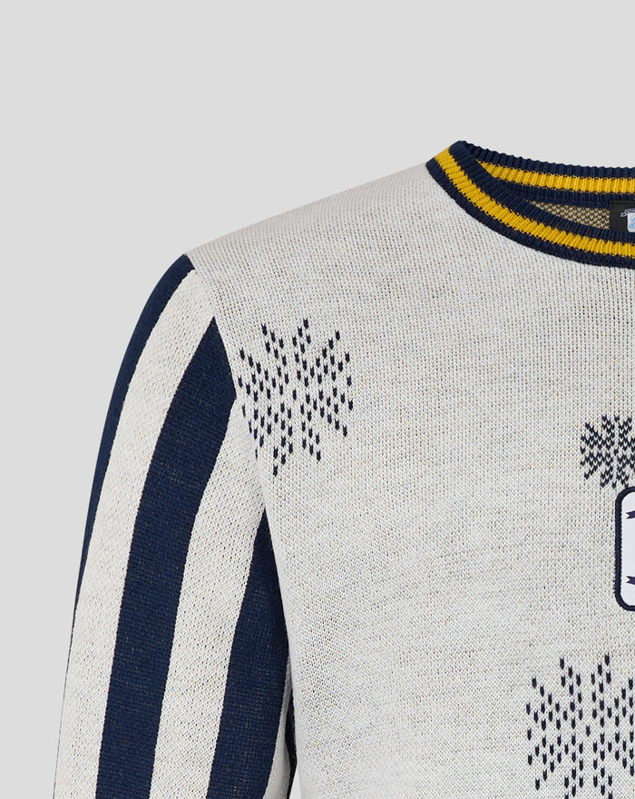 Close up of a cream knit unisex Christmas jumper with navy blue stripes and a yellow navy striped ribbed collar.