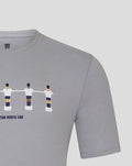 Close-up of light gray junior table football tee showing the foosball figures graphic on the chest