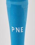 Close-up of blue sock showing white letters PNE on the calf section.