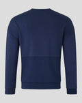 Back view of navy unisex travel crew sweatshirt showing a plain seamless back.
