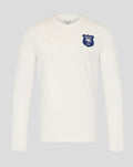Cream UNISEX remastered classic long sleeve shirt with embossed Castore logo and blue Wembley crest on the chest.