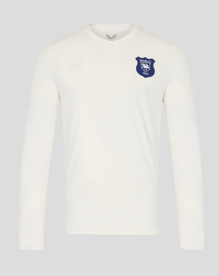 Cream UNISEX remastered classic long sleeve shirt with embossed Castore logo and blue Wembley crest on the chest.