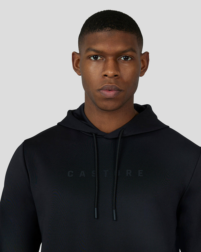 Front view of a man wearing a black scuba hoodie 3.0 with CASTORE branding across chest