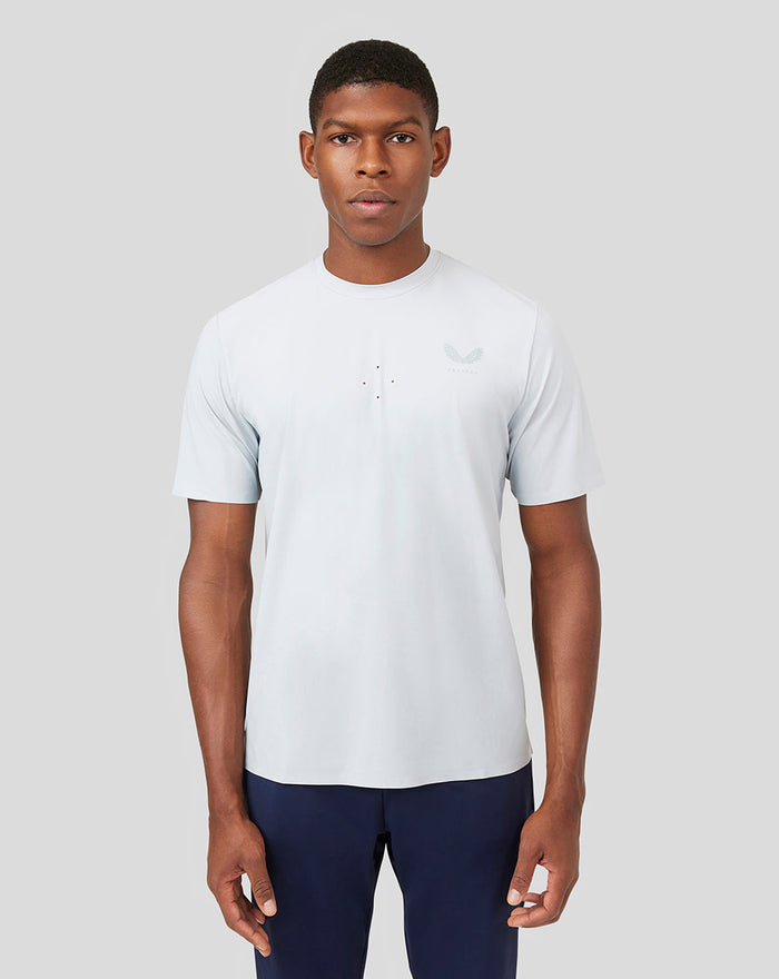 White Mist Metatek Training T-Shirt on a male model with laser cut chest details and mesh panel for breathability.