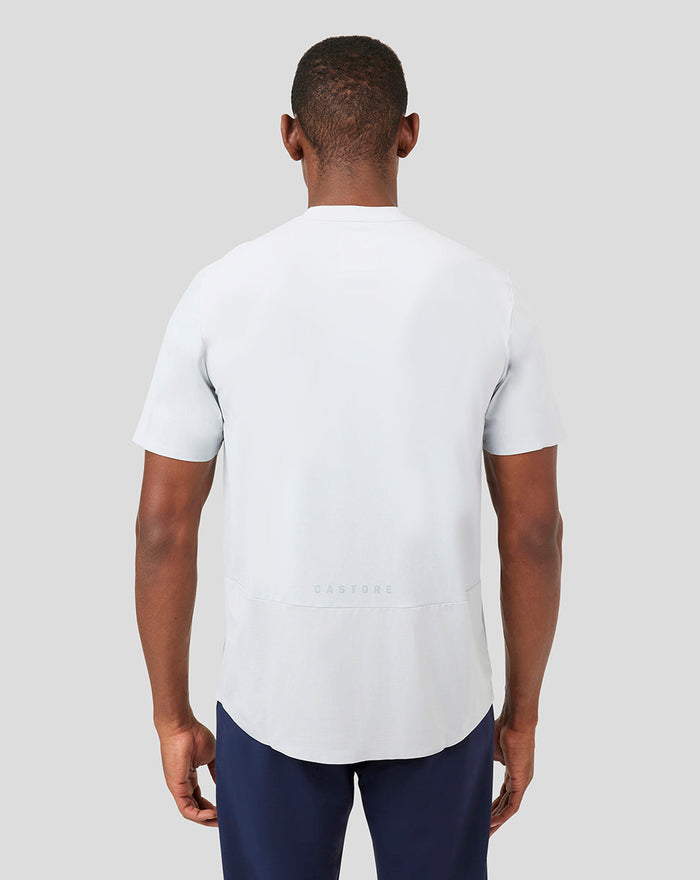 Back view of Mist Metatek Training T-Shirt in pale gray with CASTORE logo at the lower back