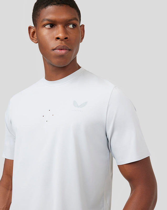 Front close-up of Mist Metatek Training T-Shirt showing chest logo and small perforation details