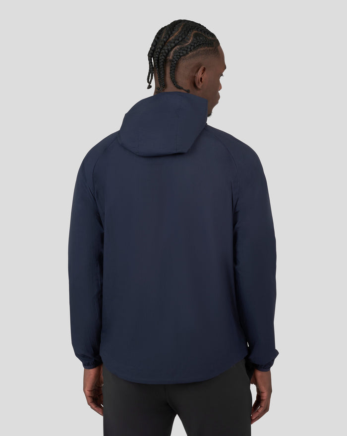 Back view of navy Metatek Flyweight Jacket with hood