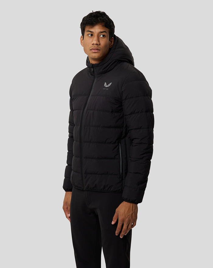 Front view of a man in a black Onyx Protek Insulated Jacket with hood and zip pockets