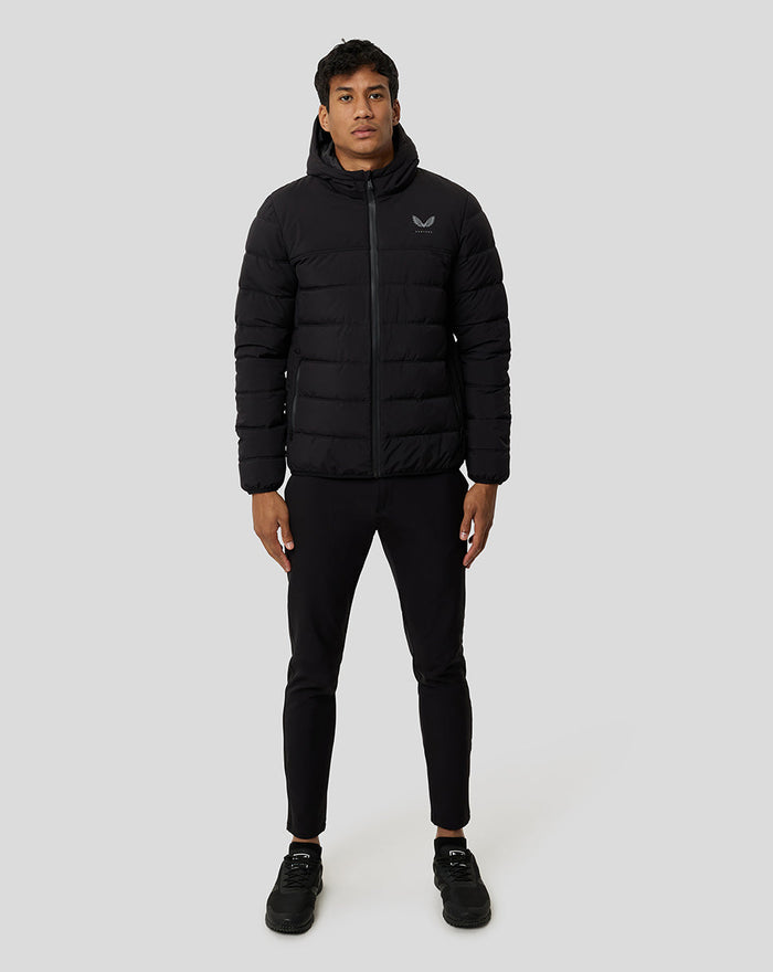 Male model wearing black Onyx Protek Insulated Jacket with hood and front zipper.