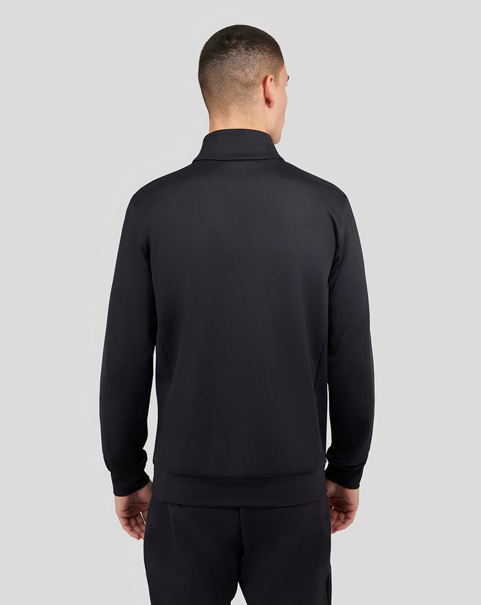 Back view of black Garcia Quarter Zip top from the Garcia Capsule collection on a model