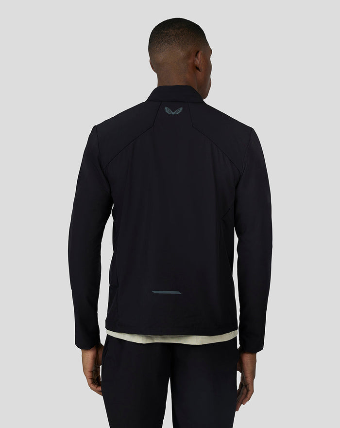 Rear view of black Carbon Capsule Hybrid Active Jacket with reflective detailing and back branding